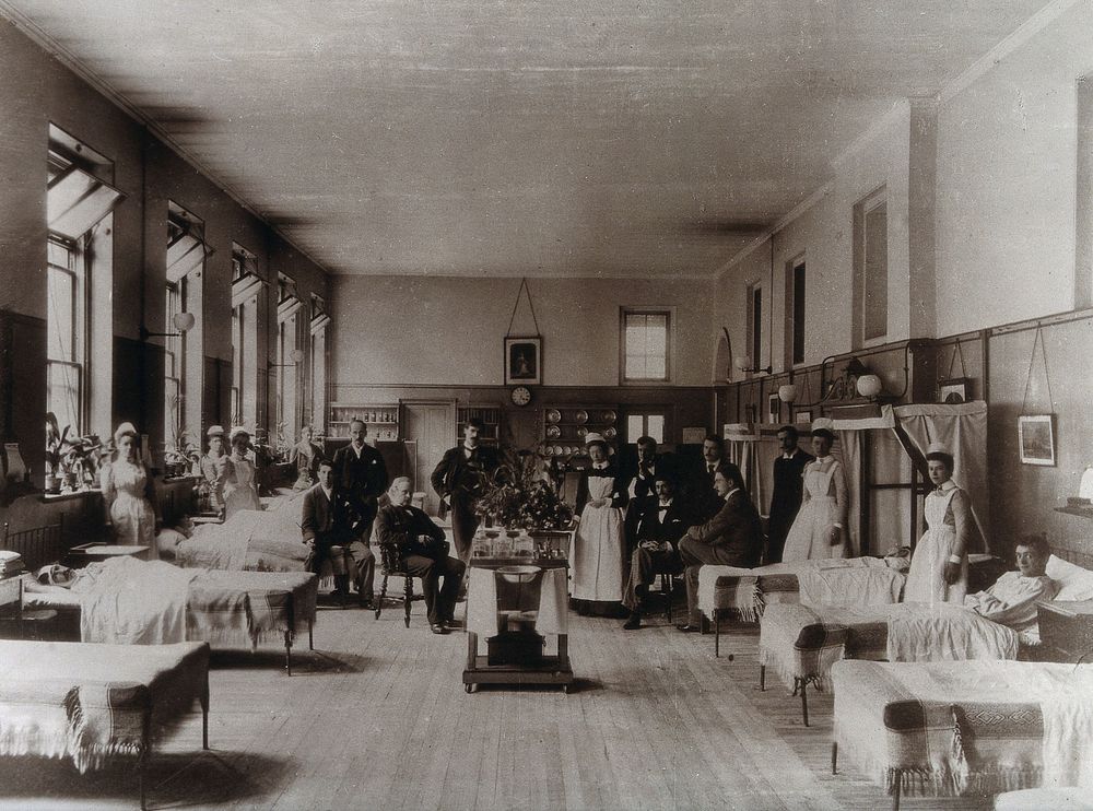 Baron Lister (seated) with his staff, Victoria ward, King's College Hospital, Lincoln's Inn Fields. Photograph, 1893.