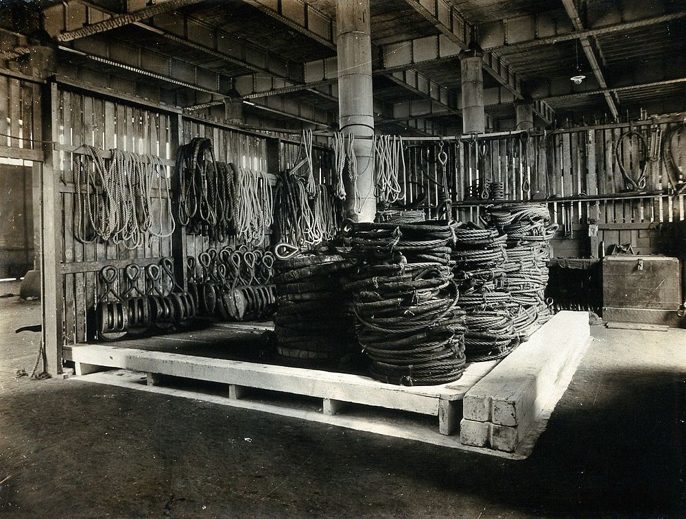 Liverpool, England: a ship storage area at the port: neatly arranged ropes and equipment. Photograph, 1900/1920.