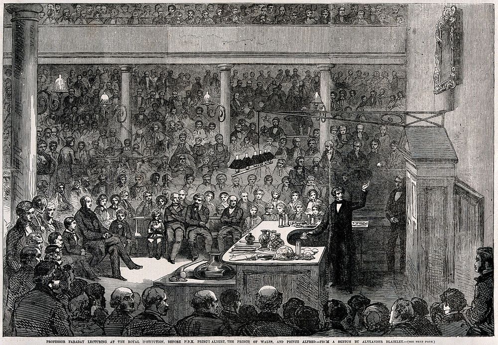 Michael Faraday lecturing at the Royal Institution: Prince Albert and his sons in the audience. Wood engraving, 1856, after…