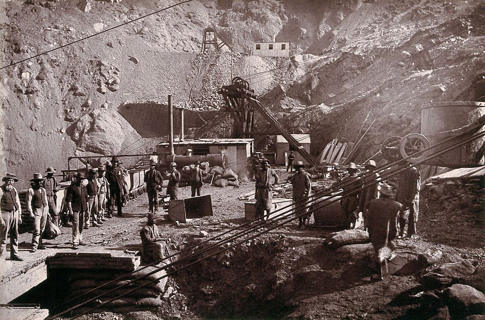 Kimberley, South Africa: miners around the Central Company's shaft in the Kimberley mine. Woodburytype, 1888, after a…