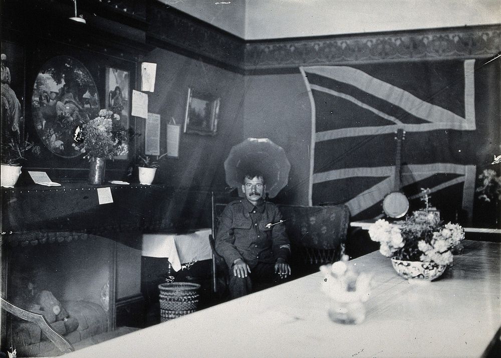 Holmleigh Auxiliary Military Hospital, Harrow: a soldier with amnesia sitting in a room with a huge Union Jack flag on the…