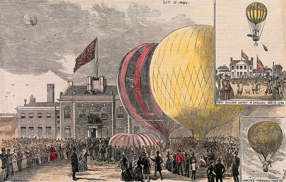 Crowds of people gathered in a square, with hot-air balloons on the ground. Coloured wood engraving after Corbould, 1884.