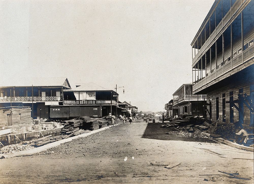 Colón, Panama; street with building works in progress. Photograph, 1907.