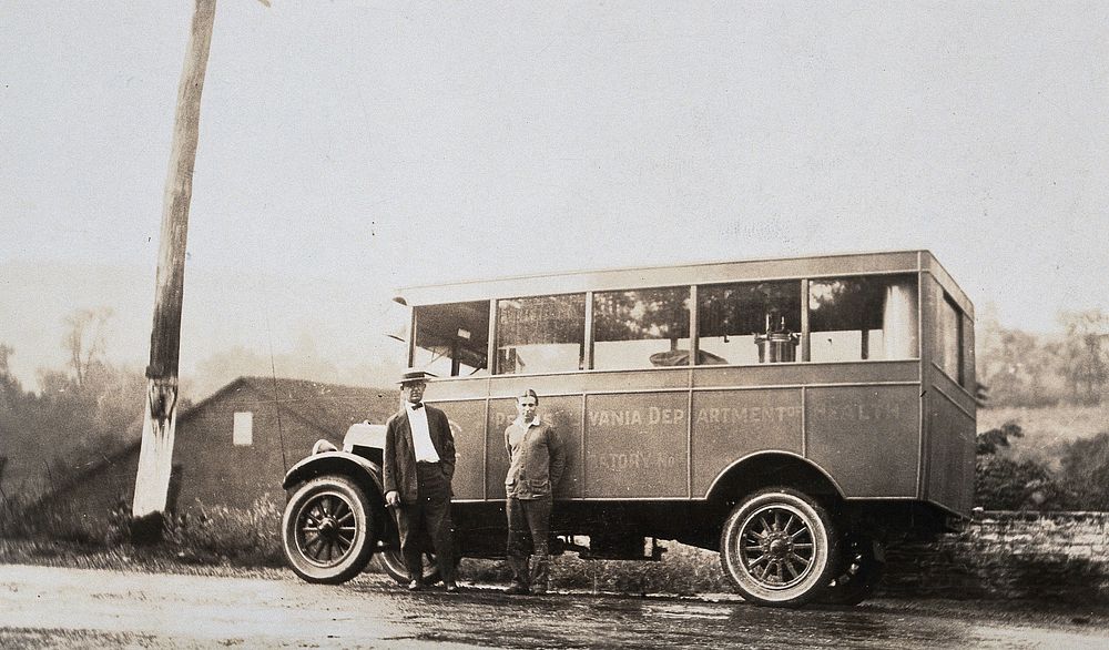 Pennsylvania state laboratory water car, owned by the Pennsylvania Department of Health: two men are shown standing in front…