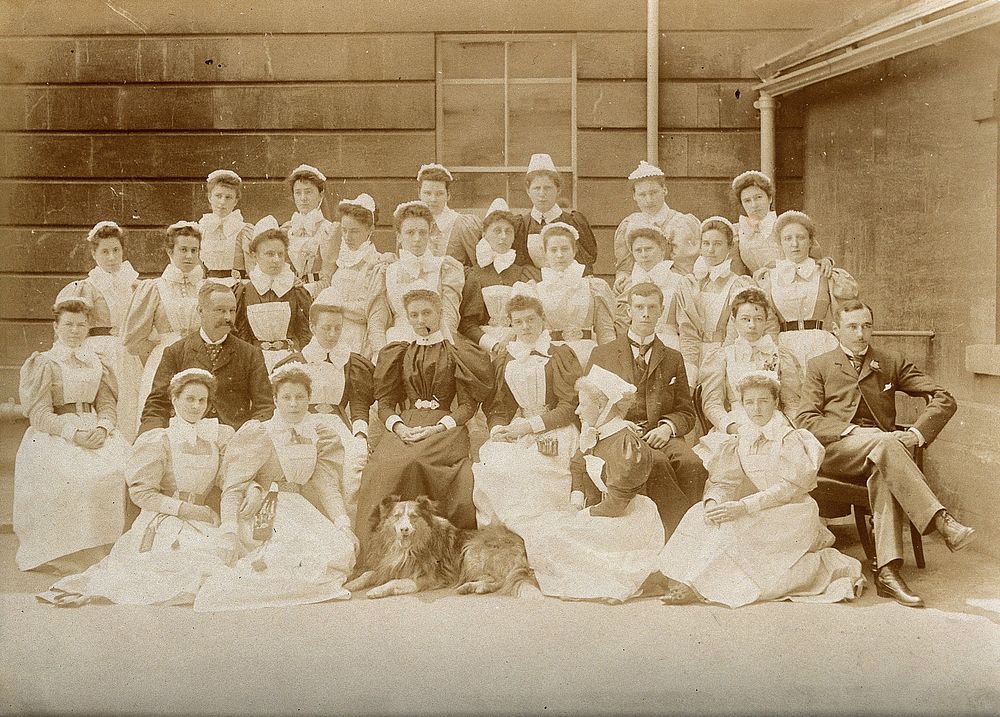 The Royal United Hospital, Bath: hospital staff (with a dog): group portrait. Photograph, ca. 1870.