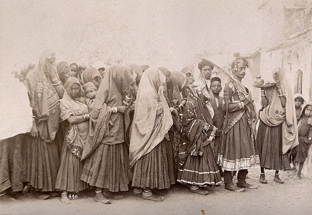 Jaipur, India: a crowd of men and women in decorative dress. Photograph, ca. 1890.