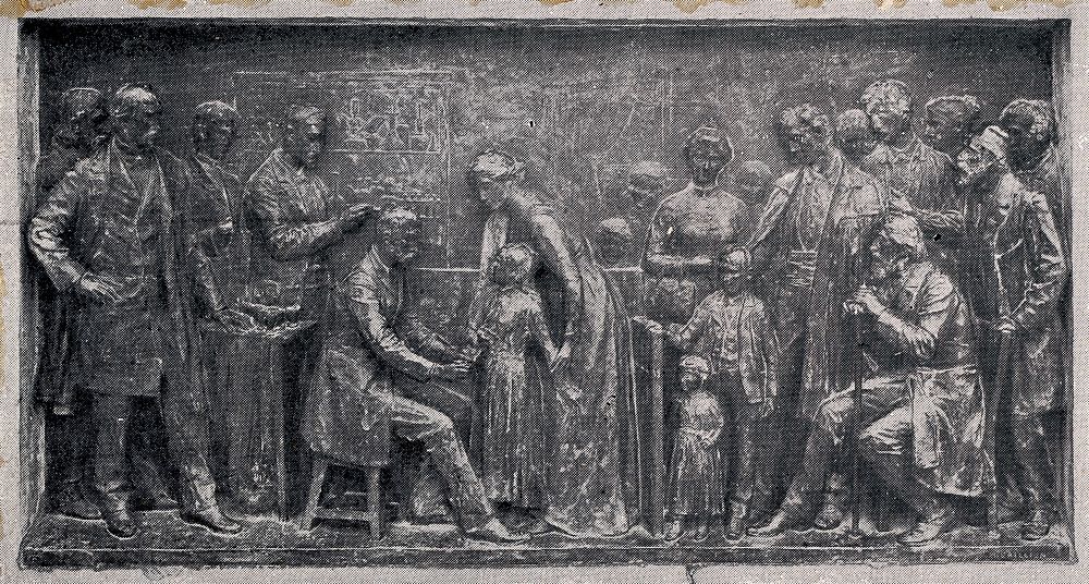 Louis Pasteur supervising the inoculation of a child against rabies. Process print after a bronze relief at the Pasteur…