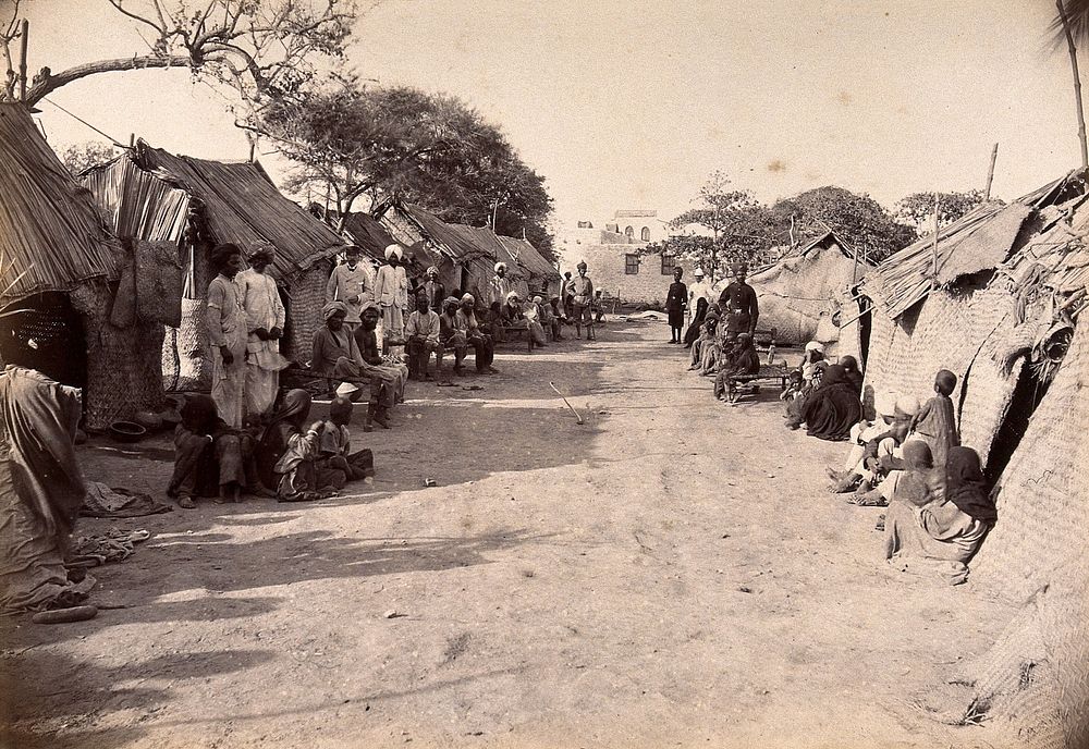 Pathway through the centre of a segregation camp during bubonic plague outbreak, Karachi, India. Photograph, 1897.
