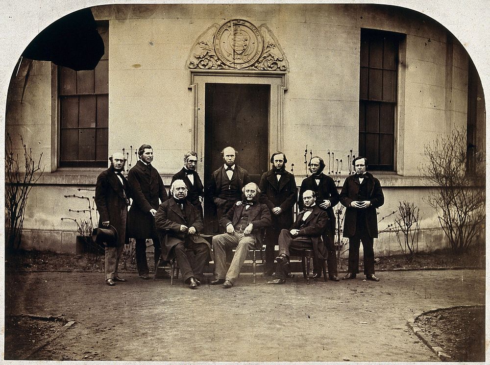 Middlesex Medical School staff outside one of the school buildings. Photograph, ca. 1865.