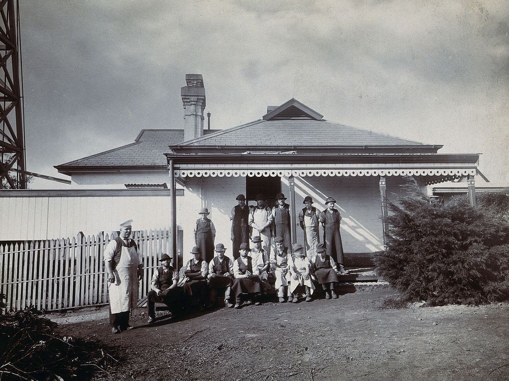 Metropolitan Lunatic Asylum, Kew, Victoria (Australia): the hospital cook and the boys who help him, on the steps of the…