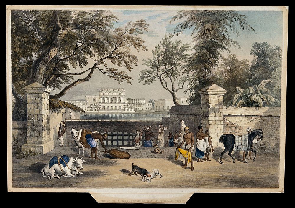 People washing and drying themselves by a river in India. Coloured lithograph.
