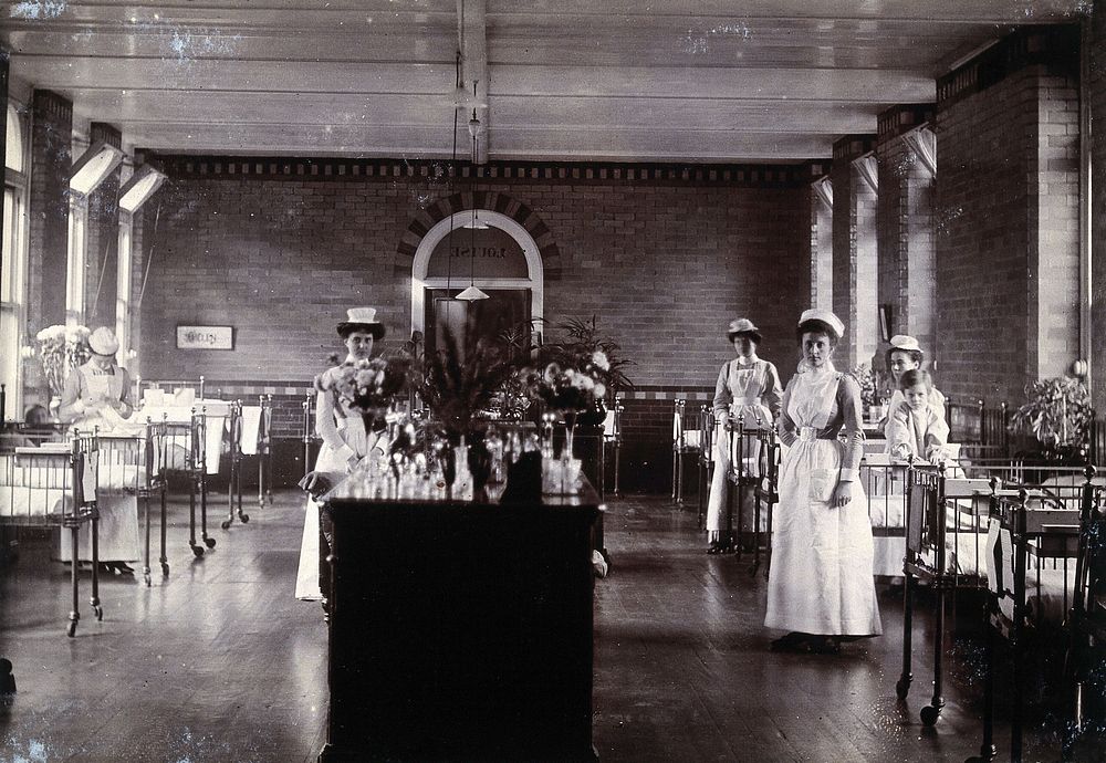 St Bartholomew's Hospital, London: nurses in a ward. Photograph, c.1908.