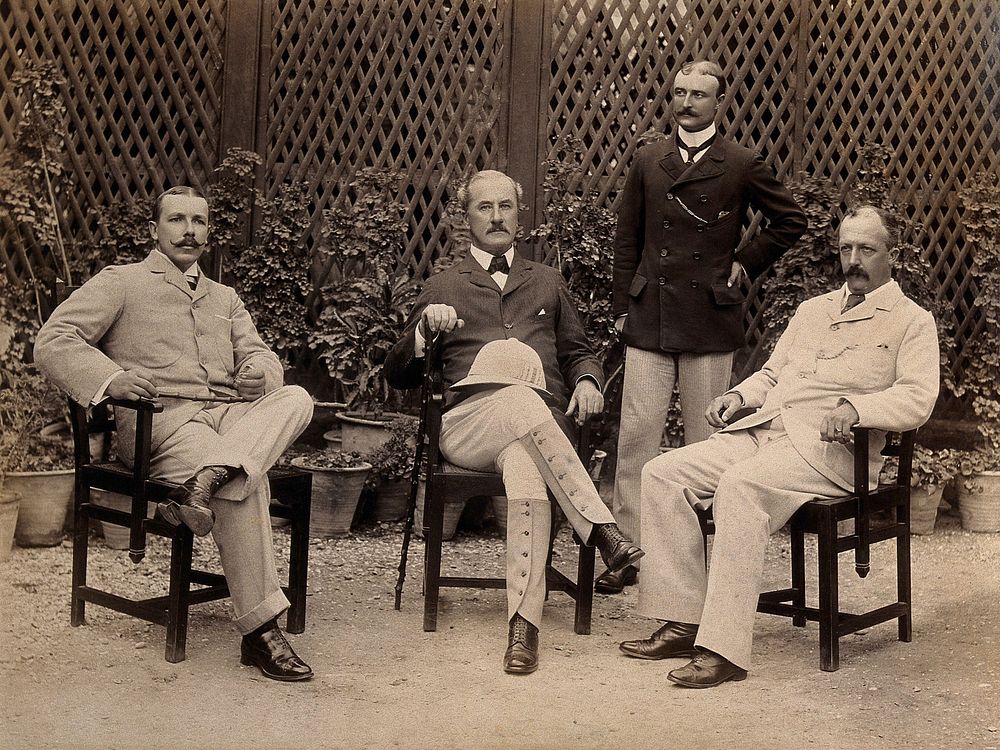 Four men from the Karachi Plague Committee, India. Photograph, 1897.
