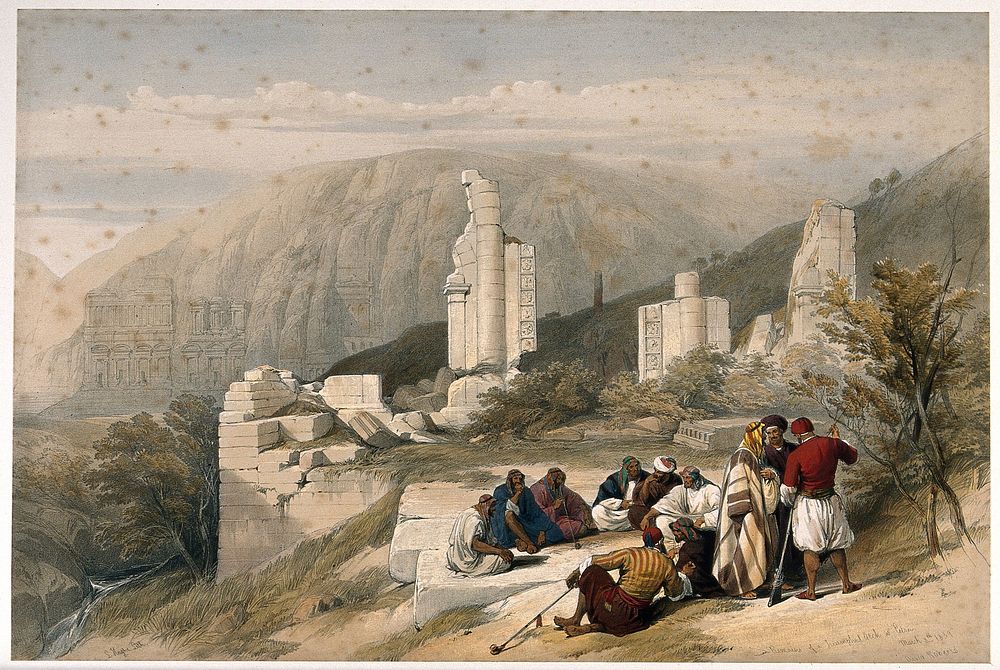 Men sitting to smoke by a ruined triumphal arch at Petra, Jordan. Coloured lithograph by L. Haghe after D. Roberts, 1839.