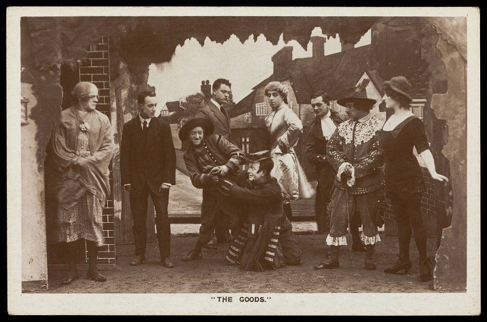 Soldiers, some in drag, performing in the concert party "The Goods". Photographic postcard, 191-.