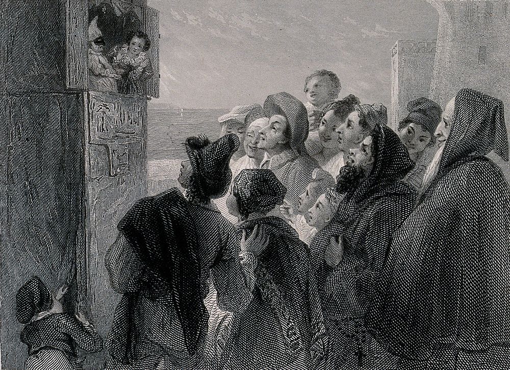 A crowd of people have gathered around a stand in the street to watch a Punch and Judy show. Engraving by J. Goodyear after…