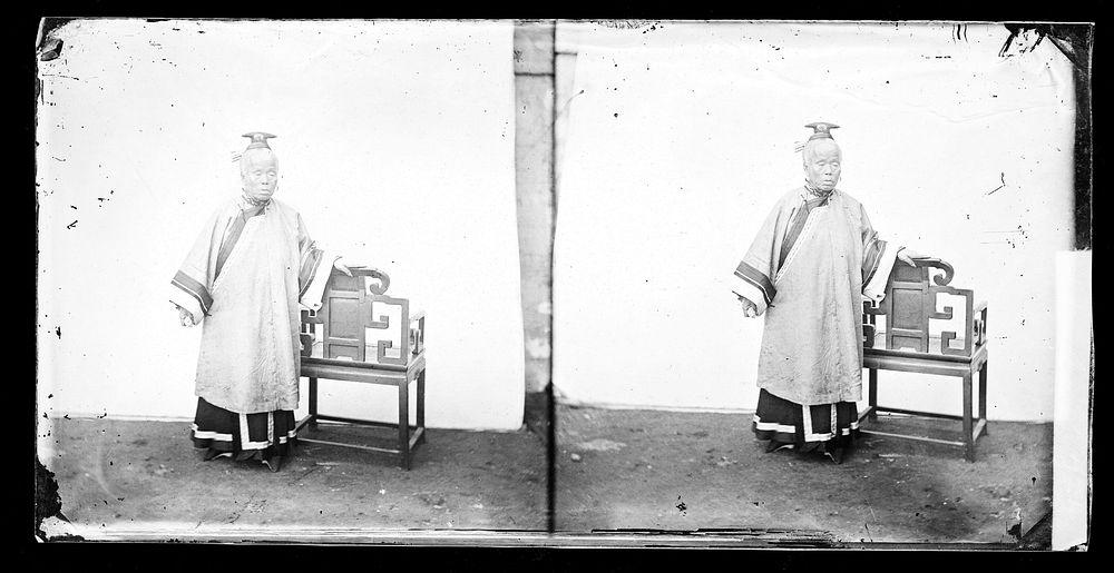Peking, Pechili province, China: an old woman standing by a chair. Photograph by John Thomson, 1869.