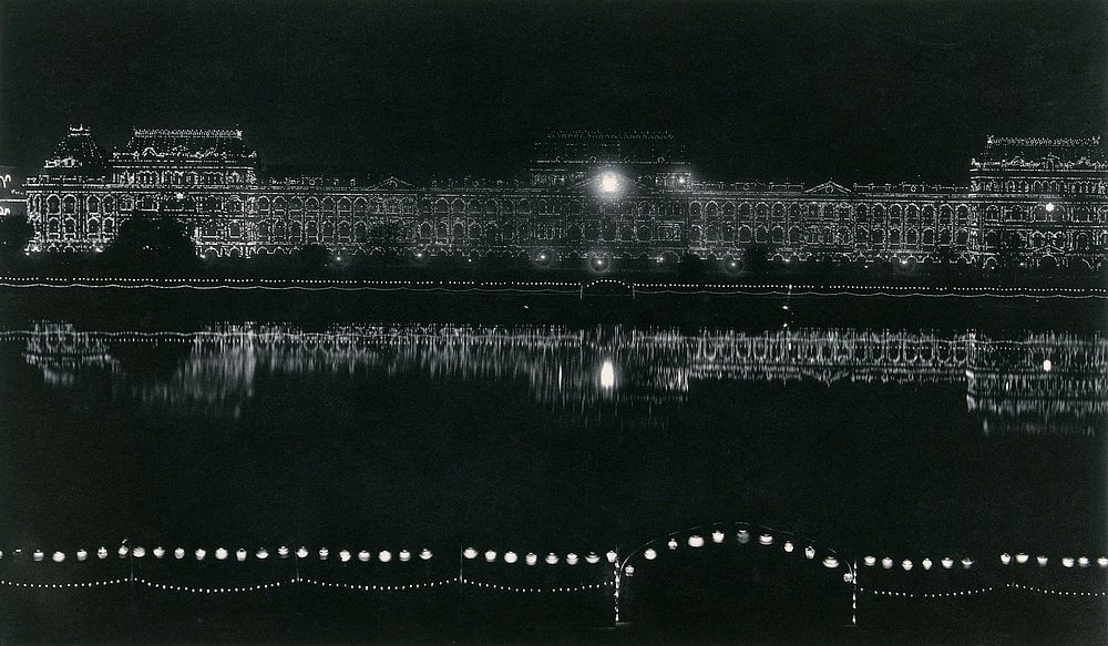 Writers' Buildings, Dalhousie Square, Calcutta, India: illuminated at night. Photograph, 1906.