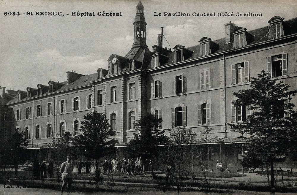 Saint Brieuc, France: the central pavilion of the hospital, viewed from the gardens. Photographic postcard, ca. 1910.