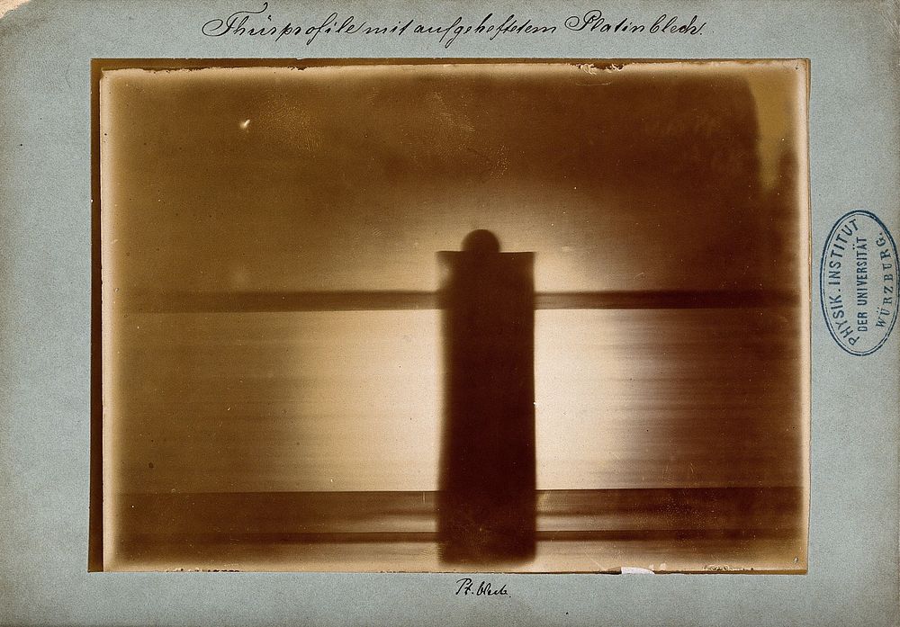 The door of Röntgen's laboratory, with a platinum plate attached to the handle, viewed under x-ray. Photoprint from…