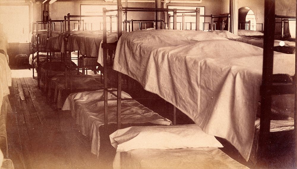 Bellevue Hospital, New York City: a dormitory with bunk beds. Photograph.