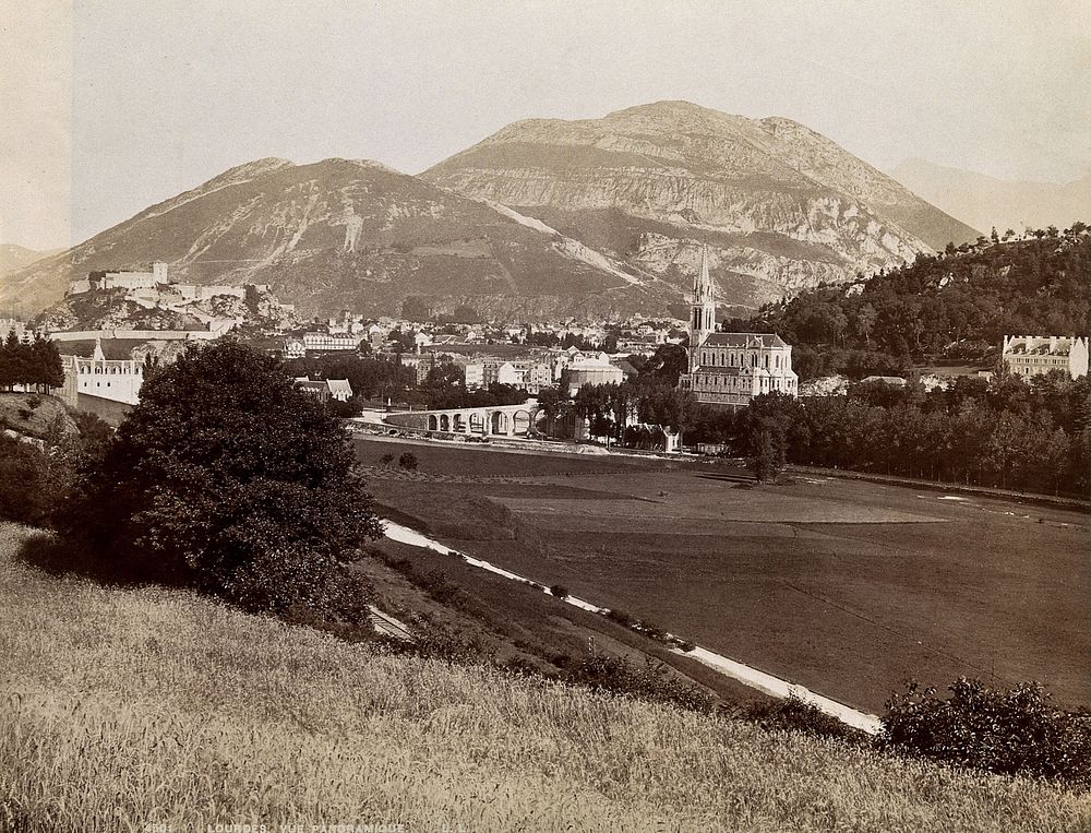 Lourdes, France: the town, cathedral and distant mountains. Photograph (by E. C. Mayes), ca. 1893.