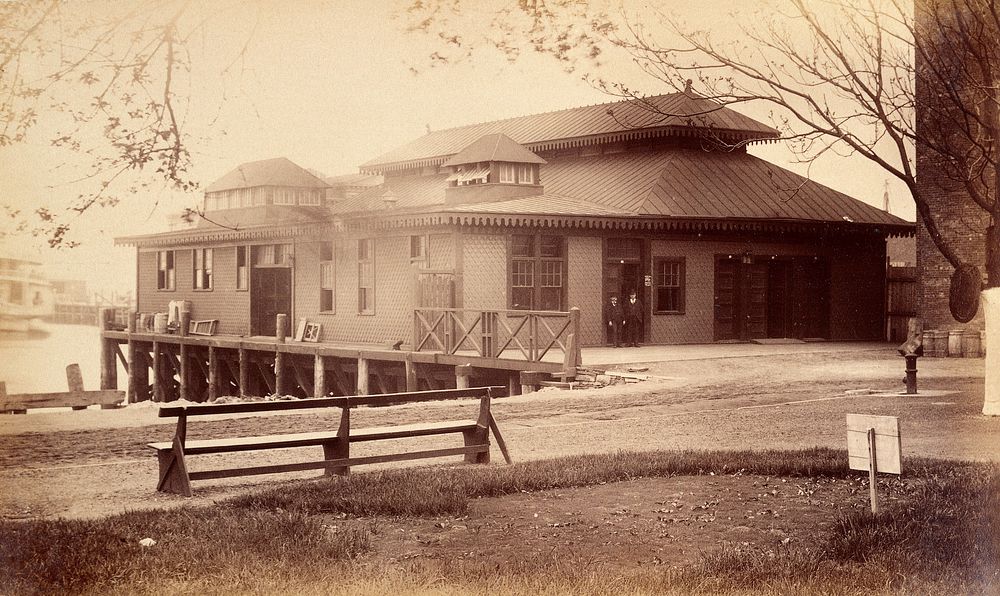 Bellevue Hospital, New York City: a lodge on a pier over the river, with two men. Photograph.
