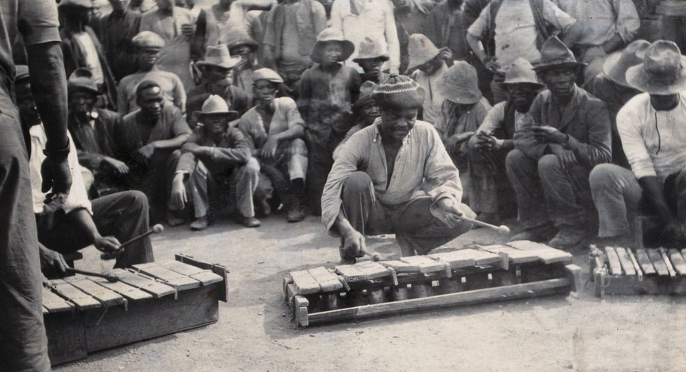 South Africa: African workers playing instruments at Dutoits Pan Mine. Photograph by A.B. Macallum, 1905.