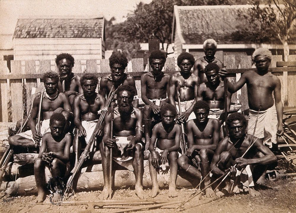 Polynesia: Polynesian men with hunting and labour tools: group portrait. Photograph attributed to André-Alexandre Jollet.