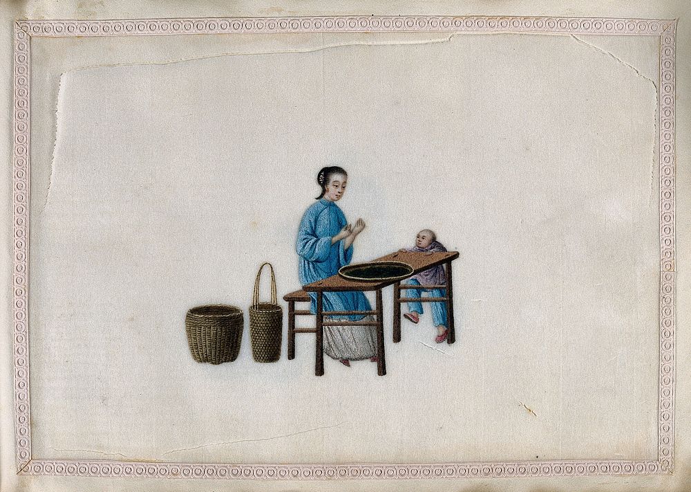 A woman examining a shallow basket of tea leaves laid on a table, watched by a small boy. Gouache by a Chinese artist, ca.…