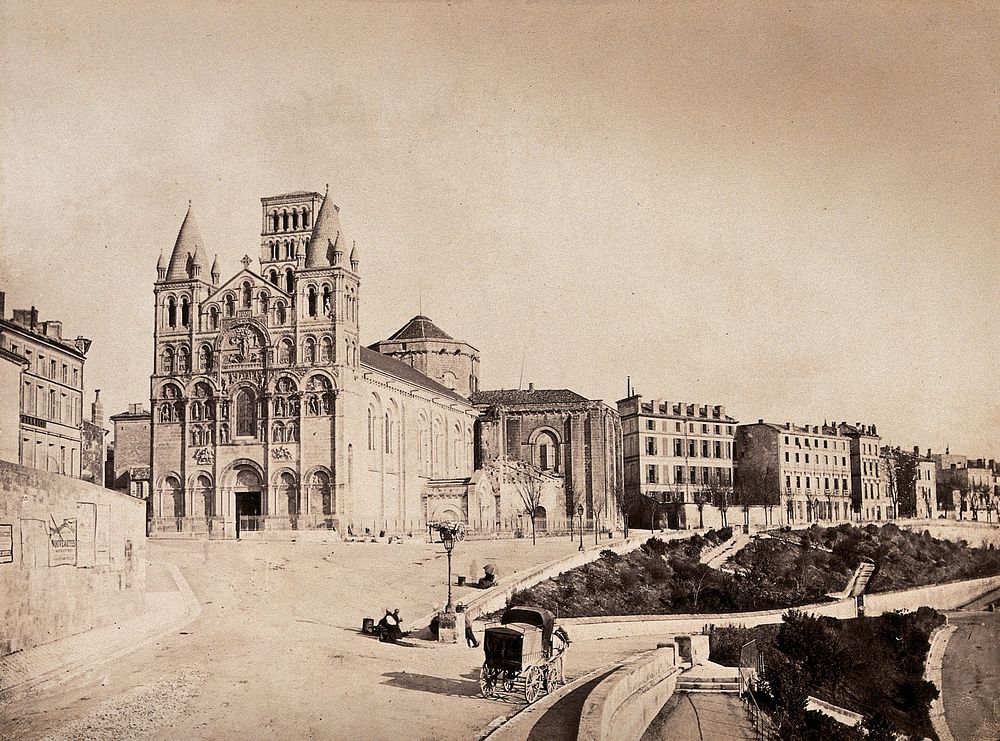Angoulême Cathedral, France; showing situation on a road adjacent to other town buildings. Photograph (by Édouard Baldus)…