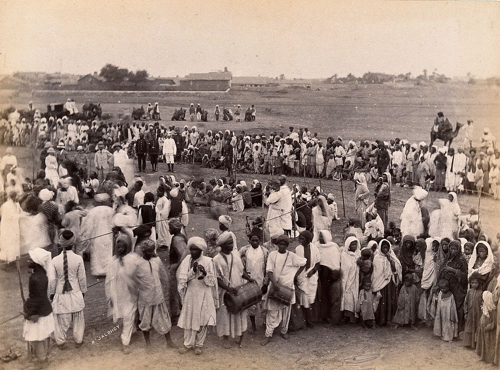 A celebratory dance for discharged patients, during the bubonic plague outbreak in Karachi, India. Photograph, 1897.