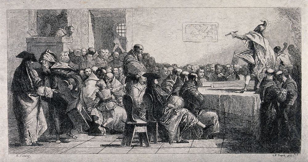 A man is performing on a table with a stick in his hand, people are sitting on chairs watching and an extra chair is being…