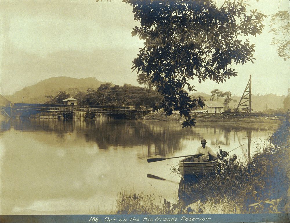 The Rio Grande Reservoir, Panama: man in boat in foreground. Photograph, ca. 1910.