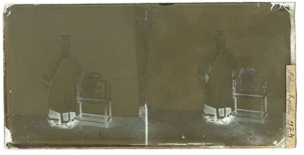 Peking, Pechili province, China: an old woman standing by a chair. Photograph by John Thomson, 1869.