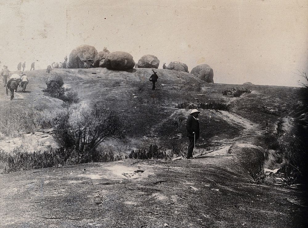 South Africa: members of the British Association climbing in the Matoppos hills. Photograph by Sir William Crookes, 1905.