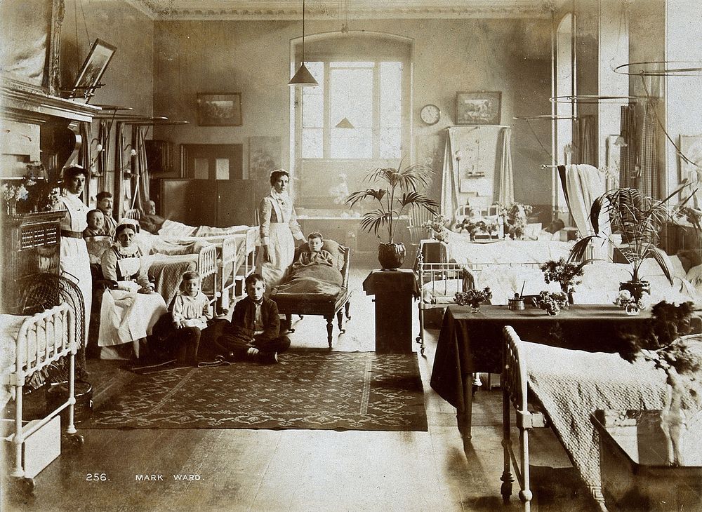 St Bartholomew's Hospital, London: patients and nurses in Mark ward. Photograph, c.1908.
