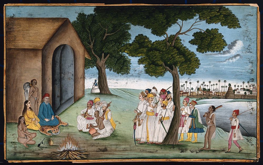 A group of people gather and listen to a man sitting on a tiger skin sing religious songs  accompanied by four musicians.…