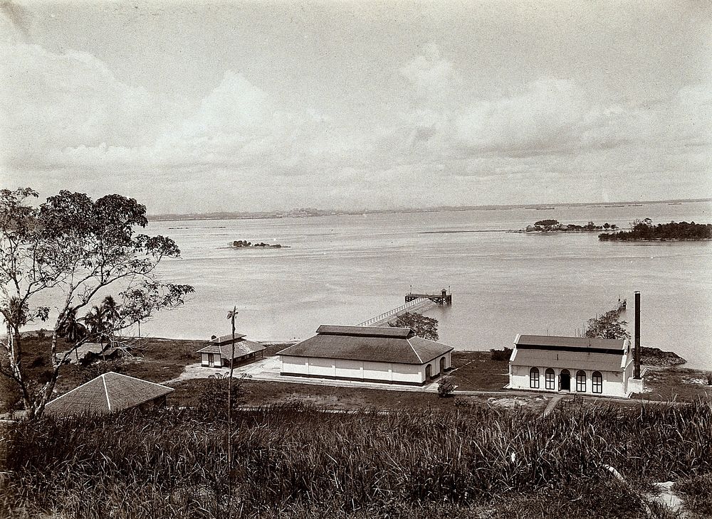 St. John's Island, Singapore: the Quarantine Station, showing the jetty, goods shed and distilling plant; small islands in…