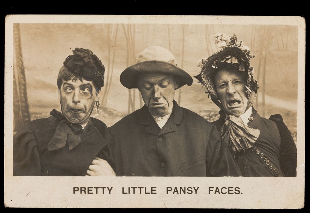 Three men in drag pulling silly expressions. Photographic postcard, 1906.