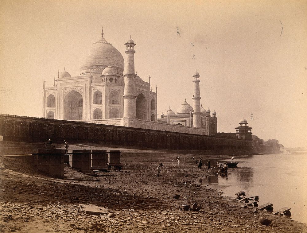The Taj Mahal, Agra, India; people on the banks of the river in the foreground. Photograph, ca. 1900.