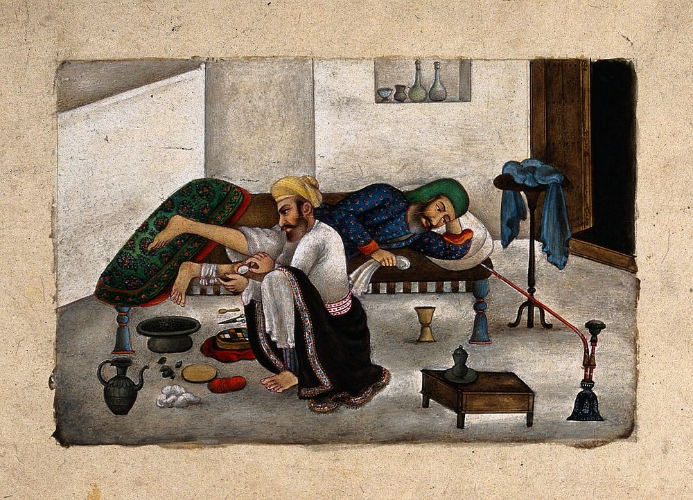 A surgeon, sitting on the floor, attends to a patient's leg, as he lies on a bed. Gouache painting by an Indian artist, ca.…
