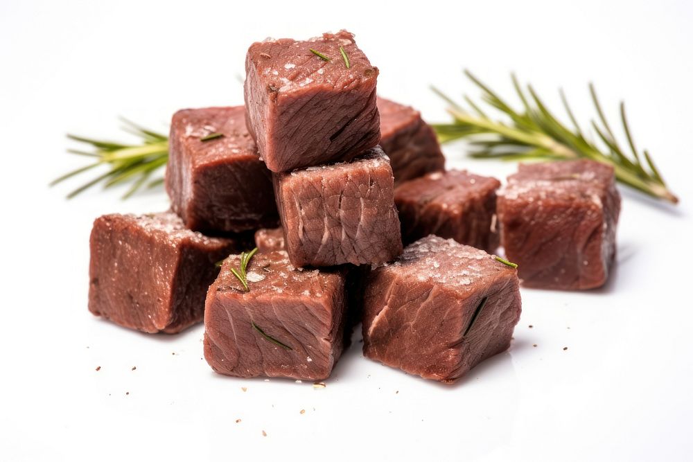 Beef cubes with rosemary food meat white background.