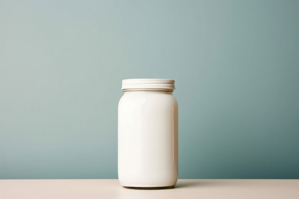 Jar white milk refreshment.