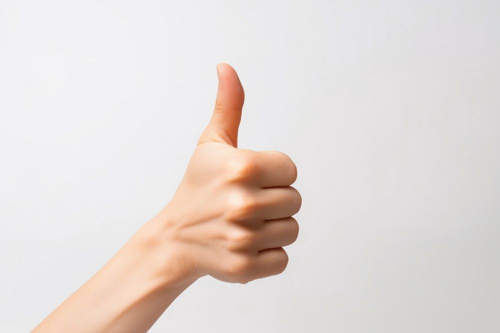 Hand thumb up finger white background gesturing.