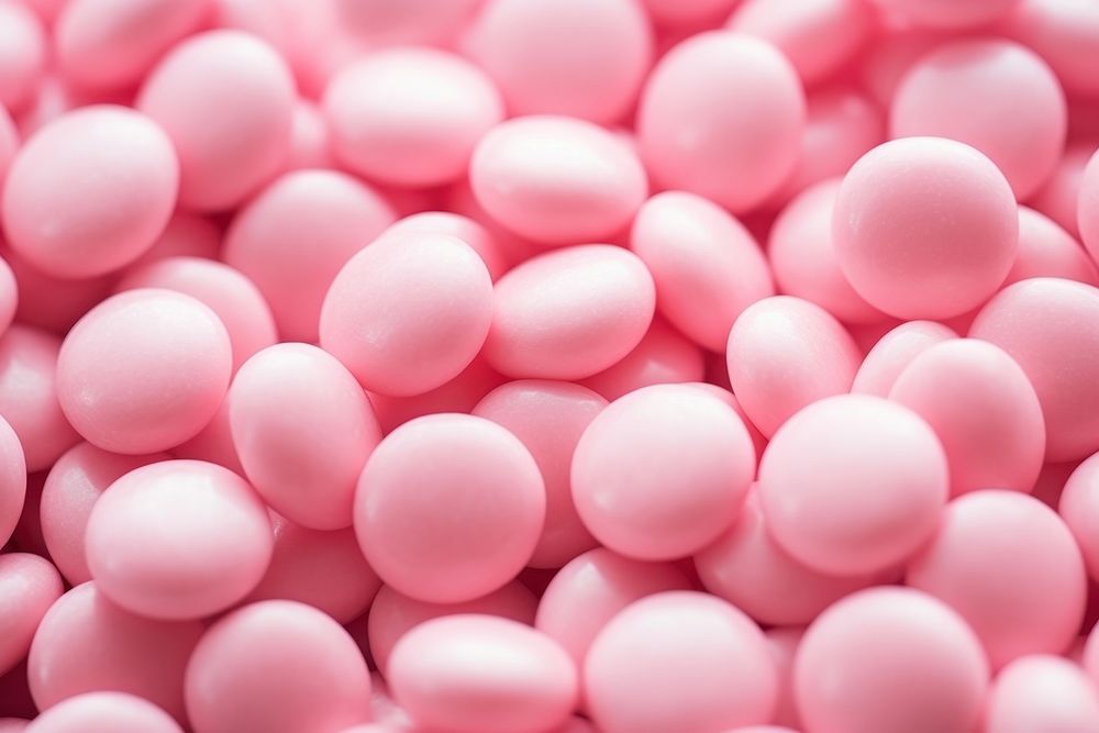 Pink candy confectionery backgrounds pill.
