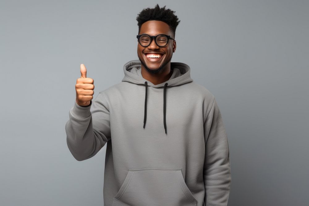 Black man wear glasses and grey hoodie hold clipboard sweatshirt portrait smile.