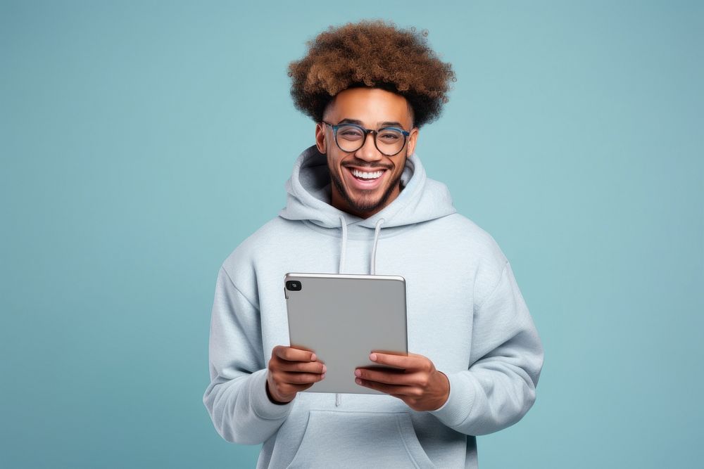 Black man wear glasses and grey hoodie hold clipboard smile computer portrait.