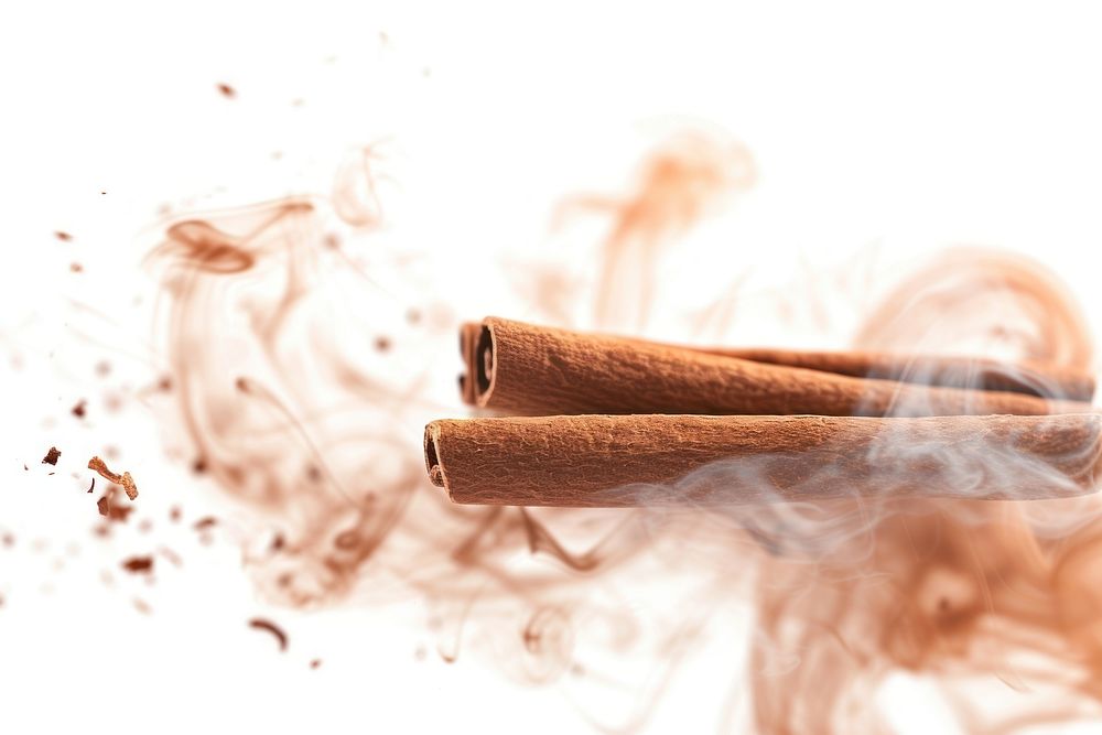 Cinnamon smoke white background cigarette.