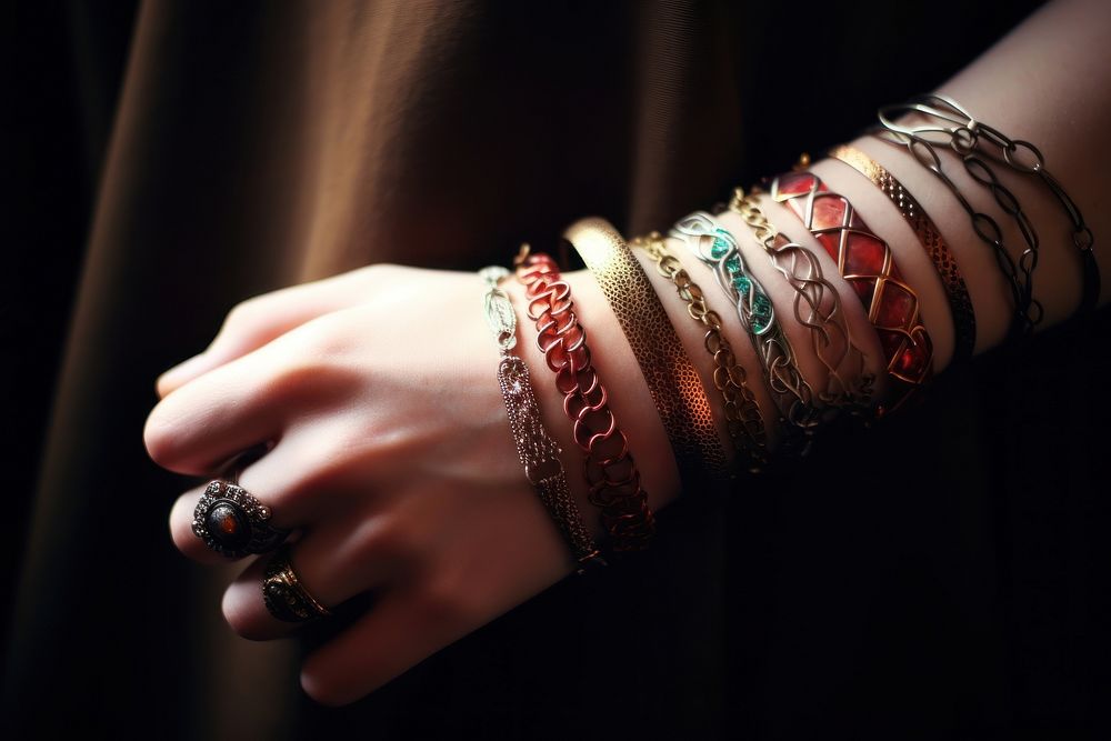Bracelets on arms jewelry bangles finger.